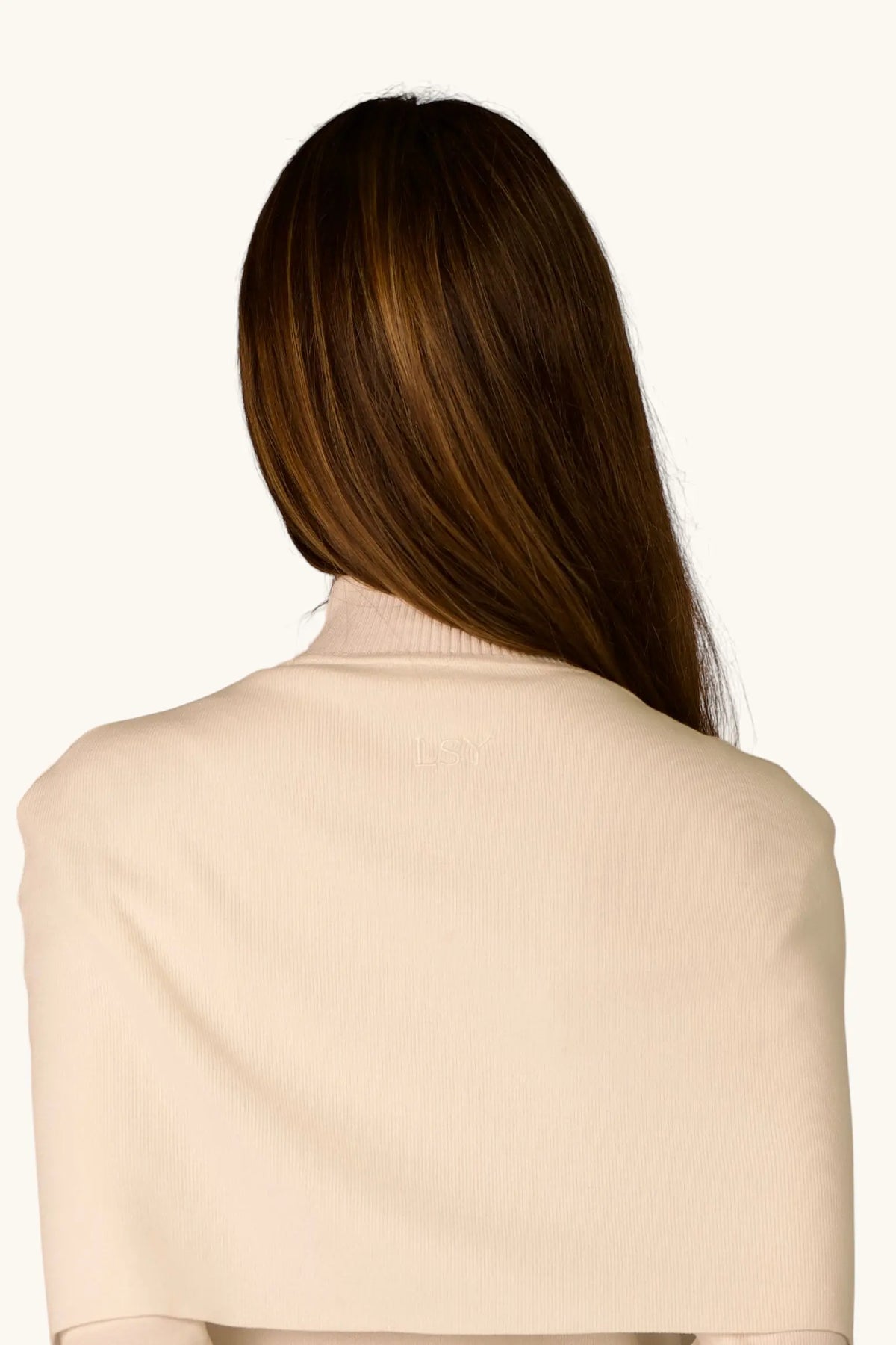 Gebreide jurk met cape-detail