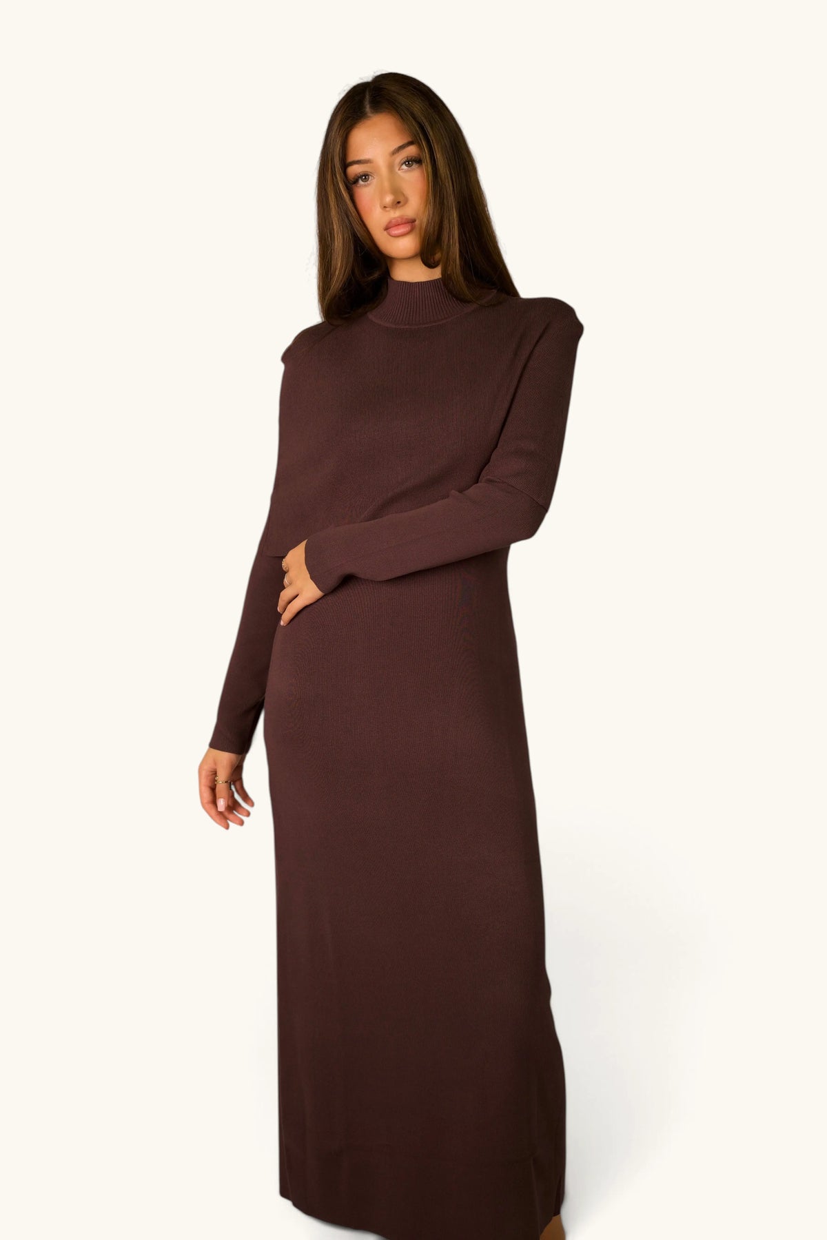 Gebreide jurk met cape-detail